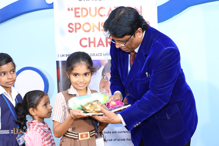 Grace Ministry, Bro Andrew Richard contributed 50 poor students free education scholarship at its centre on account of Christmas season in Mangalore here on Dec 15th, Sunday, 2019. 